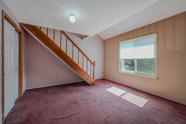35 Gibbs Rd Unit 39, Coram, NY 11727 - unfurnished living room with carpet floors, stairway, and baseboards