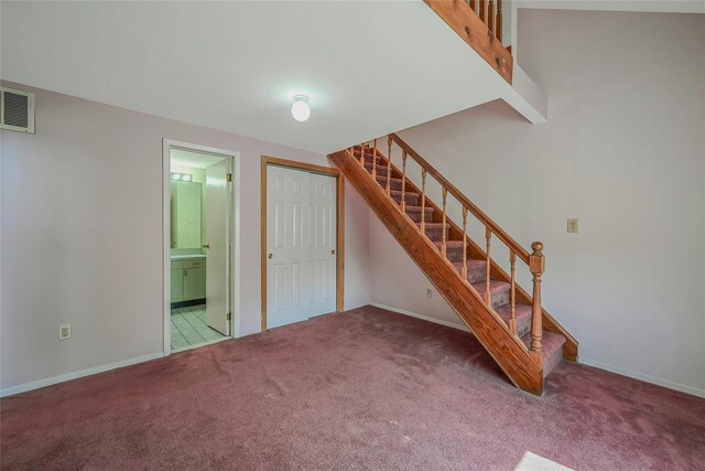 35 Gibbs Rd Unit 39, Coram, NY 11727 - stairway featuring carpet and baseboards