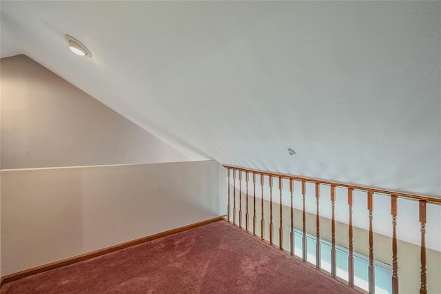 35 Gibbs Rd Unit 39, Coram, NY 11727 - additional living space with lofted ceiling, carpet flooring, and baseboards
