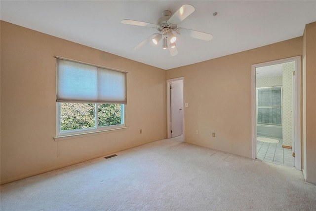 35 Gibbs Rd Unit 39, Coram, NY 11727 - spare room featuring light colored carpet and a ceiling fan