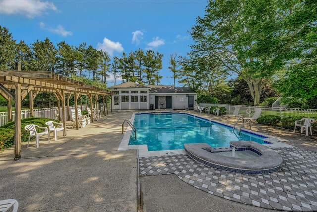 35 Gibbs Rd Unit 39, Coram, NY 11727 - community pool with a pergola, a patio area, an outbuilding, a jacuzzi, and an exterior structure
