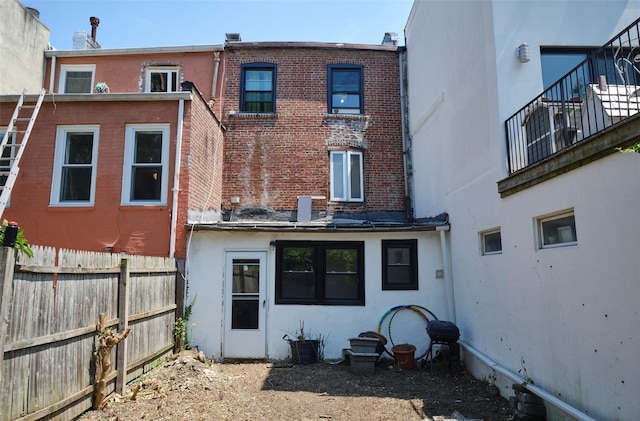 99 Pioneer St, Brooklyn, NY 11231 - rear view of house featuring brick siding and stucco siding