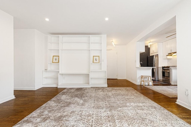 36 Hamilton Ave Unit 6S, Staten Island, NY 10301 - unfurnished living room with dark wood-style flooring, baseboards, built in features, and recessed lighting