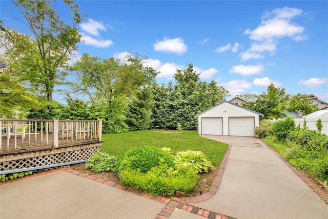 23 Lenox Pl, Freeport, NY 11520 - view of grassy yard featuring a garage, a deck, and an outdoor structure