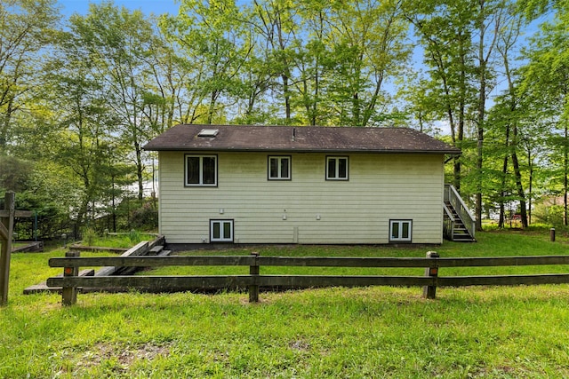 16 Fairway Dr, Eldred, NY 12743 - back of property with stairs and a lawn