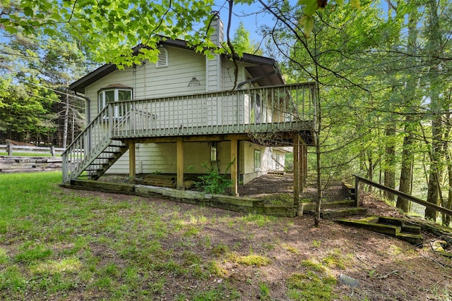 16 Fairway Dr, Eldred, NY 12743 - view of front of property with stairway, a deck, and a chimney
