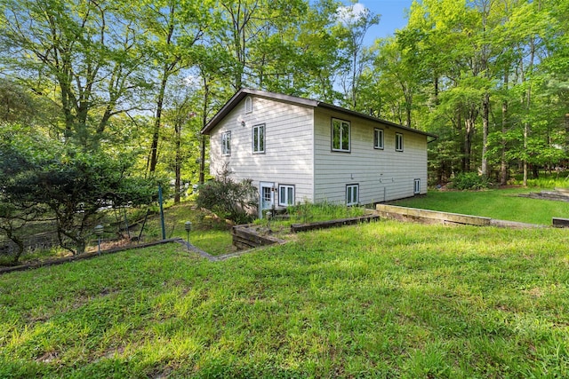 16 Fairway Dr, Eldred, NY 12743 - view of property exterior featuring a yard