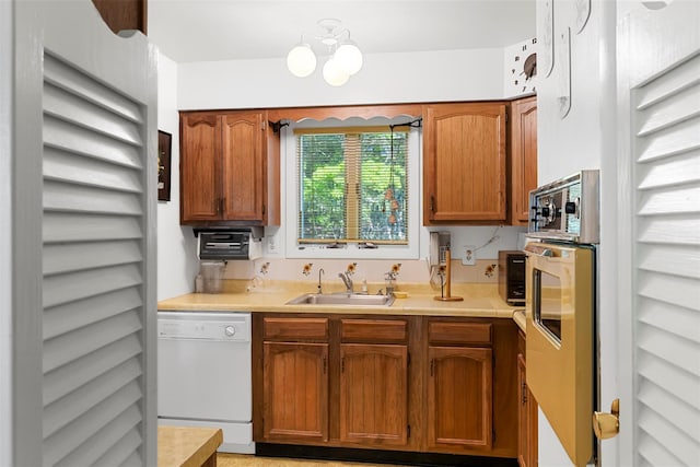 16 Fairway Dr, Eldred, NY 12743 - kitchen featuring dishwasher, a sink, light countertops, and oven