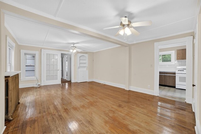 108 Union Ave, Peekskill, NY 10566 - unfurnished living room featuring ceiling fan, light wood-type flooring, and ornamental molding