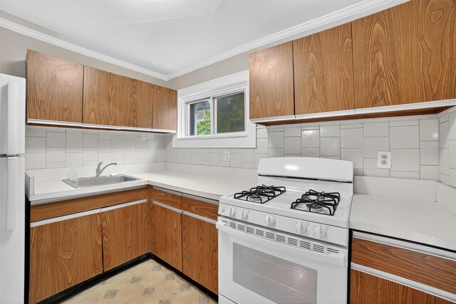 108 Union Ave, Peekskill, NY 10566 - kitchen featuring white appliances, crown molding, light countertops, brown cabinets, and decorative backsplash