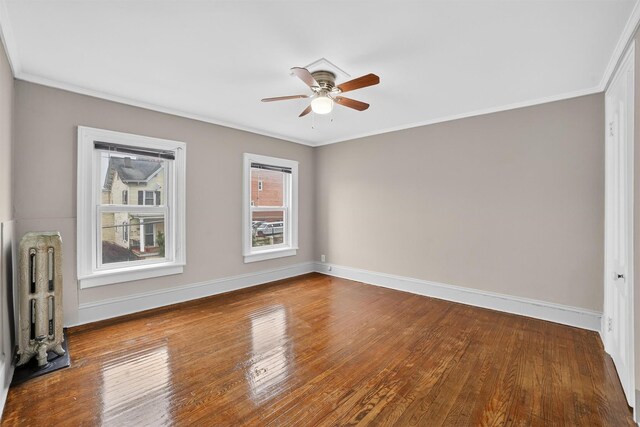 108 Union Ave, Peekskill, NY 10566 - unfurnished room with ceiling fan, radiator, wood finished floors, and ornamental molding