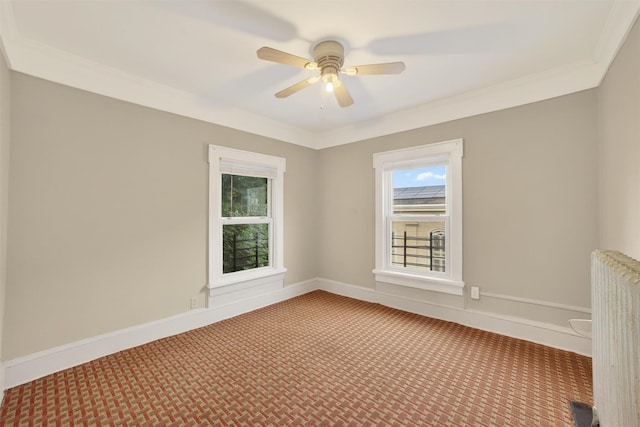 108 Union Ave, Peekskill, NY 10566 - spare room with carpet, plenty of natural light, radiator heating unit, ceiling fan, and ornamental molding