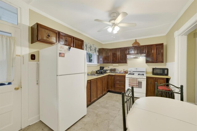 108 Union Ave, Peekskill, NY 10566 - kitchen featuring white appliances, under cabinet range hood, ceiling fan, light countertops, and crown molding