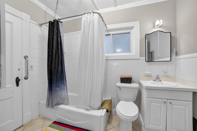 108 Union Ave, Peekskill, NY 10566 - bathroom with tile patterned flooring, vanity, shower / bathtub combination with curtain, ornamental molding, and tile walls