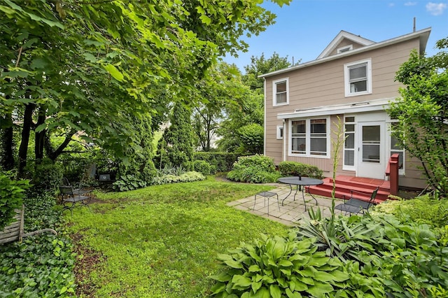 108 Union Ave, Peekskill, NY 10566 - view of green lawn with a patio area