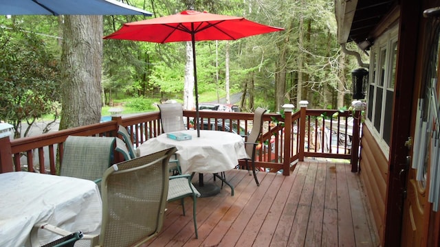 17 W Thompson Pl, Smallwood, NY 12778 - wooden deck featuring outdoor dining area and a forest view
