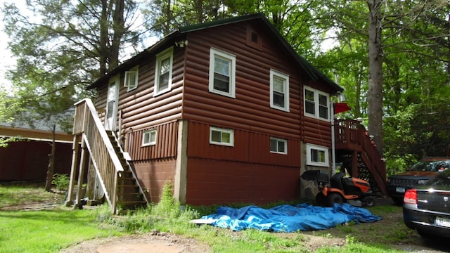 17 W Thompson Pl, Smallwood, NY 12778 - view of side of home with stairway and faux log siding