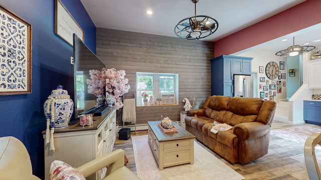 7 Didio Ln, Montgomery, NY 12549 - living room featuring light wood-type flooring, recessed lighting, a baseboard heating unit, and a chandelier