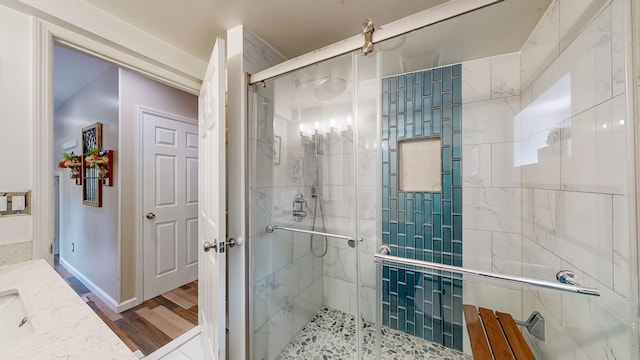7 Didio Ln, Montgomery, NY 12549 - full bath featuring a shower stall and wood finished floors