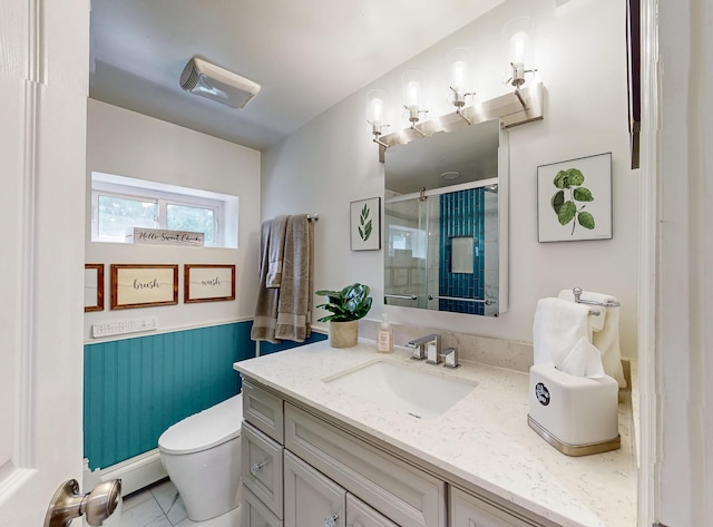7 Didio Ln, Montgomery, NY 12549 - bathroom with vanity, a shower stall, and wainscoting