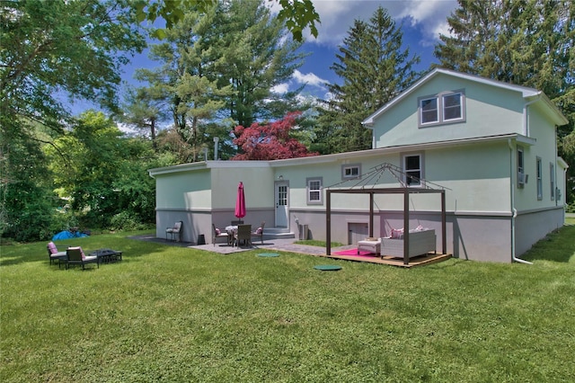 7 Didio Ln, Montgomery, NY 12549 - rear view of house featuring a patio, a lawn, a gazebo, an outdoor hangout area, and view of wooded area