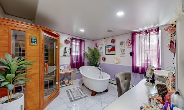 7 Didio Ln, Montgomery, NY 12549 - full bathroom featuring a freestanding bath, a baseboard heating unit, and recessed lighting