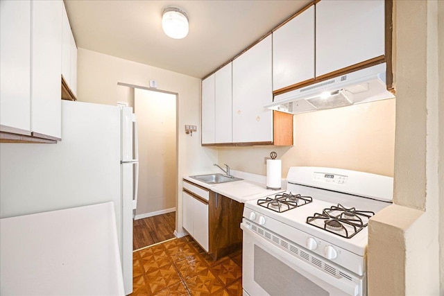 2015 St Paul Ave Unit 3G, Bronx, NY 10461 - kitchen with white appliances, under cabinet range hood, a sink, white cabinetry, and light countertops