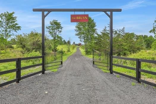 356 Bruyn Tpke, Wallkill, NY 12589 - view of dirt / gravel road featuring a gate and a gated entry