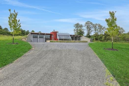 356 Bruyn Tpke, Wallkill, NY 12589 - view of front of house with driveway and a front lawn