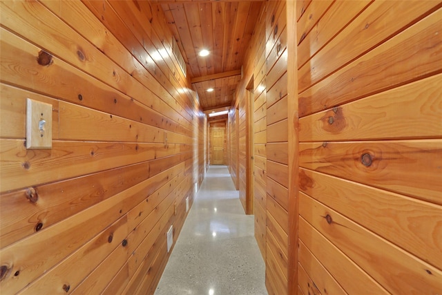 356 Bruyn Tpke, Wallkill, NY 12589 - hallway featuring wood walls, speckled floor, wooden ceiling, and recessed lighting