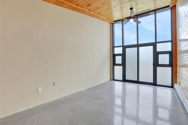 356 Bruyn Tpke, Wallkill, NY 12589 - unfurnished room featuring ceiling fan and floor to ceiling windows