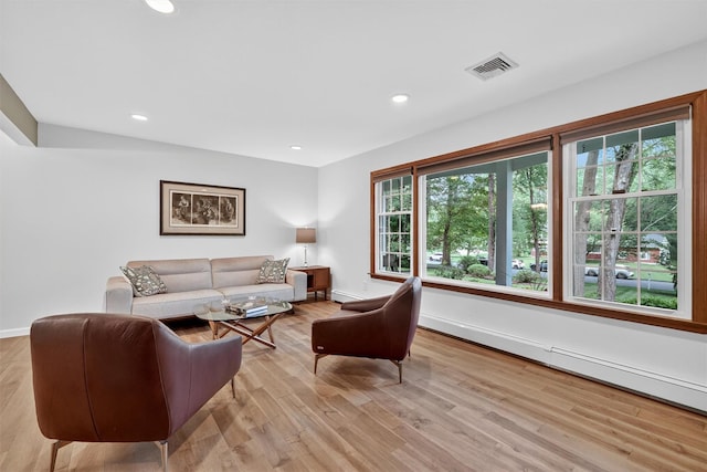 11 Robin Hood Rd, Montebello, NY 10901 - living area with light wood-type flooring, a baseboard radiator, and recessed lighting