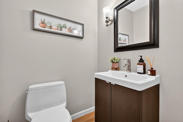 11 Robin Hood Rd, Montebello, NY 10901 - half bath with vanity and wood finished floors