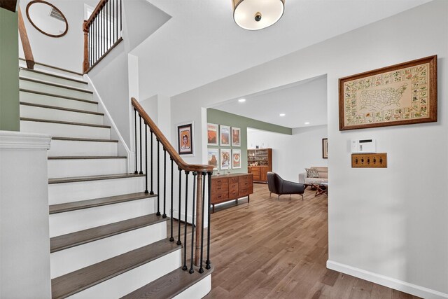 11 Robin Hood Rd, Montebello, NY 10901 - stairs with wood finished floors and recessed lighting