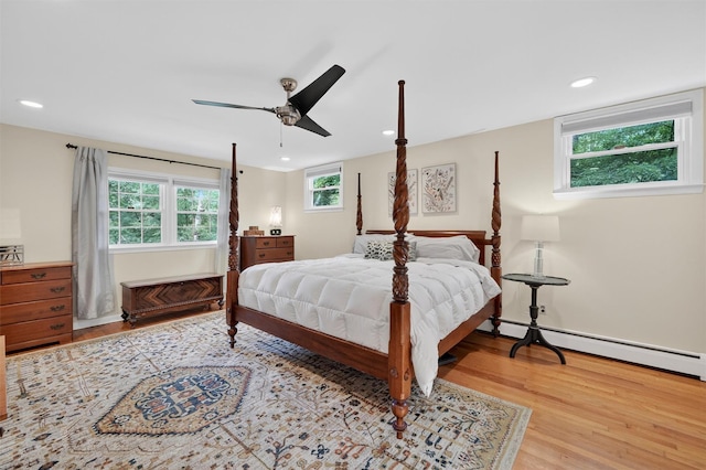 11 Robin Hood Rd, Montebello, NY 10901 - bedroom featuring light wood-type flooring, recessed lighting, baseboard heating, and ceiling fan