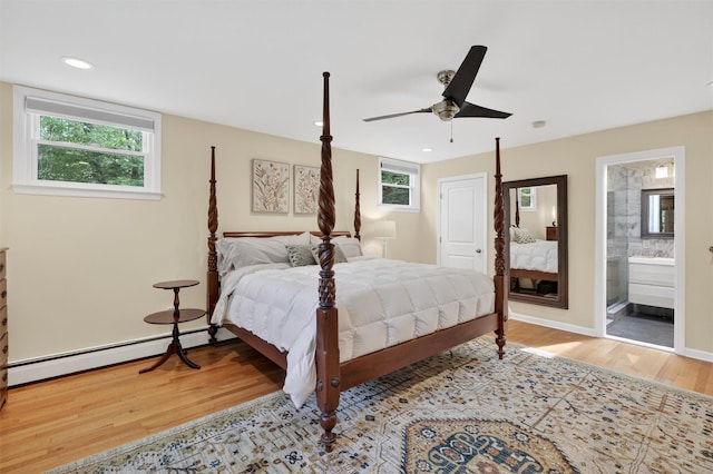 11 Robin Hood Rd, Montebello, NY 10901 - bedroom featuring wood finished floors, baseboard heating, recessed lighting, ceiling fan, and ensuite bathroom