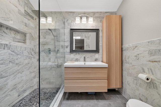 11 Robin Hood Rd, Montebello, NY 10901 - bathroom with tile walls, vanity, walk in shower, and a chandelier