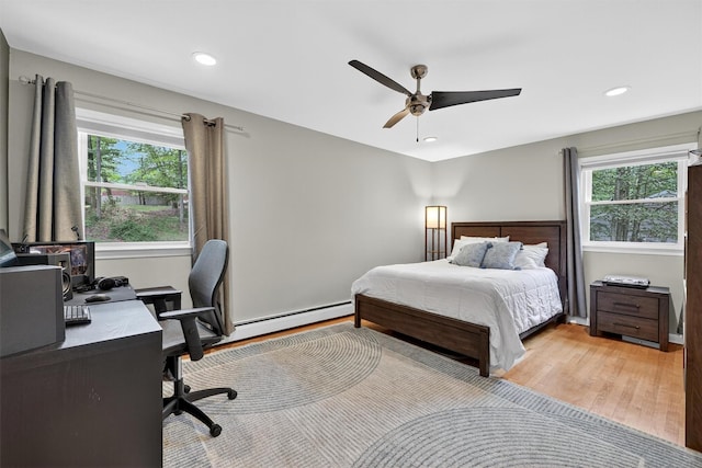 11 Robin Hood Rd, Montebello, NY 10901 - bedroom featuring multiple windows, a desk, light wood-style floors, recessed lighting, and ceiling fan