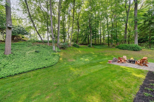 11 Robin Hood Rd, Montebello, NY 10901 - view of grassy yard featuring an outdoor fire pit