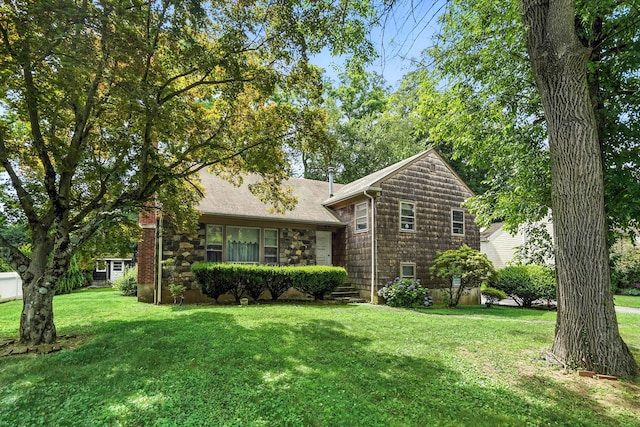 239 Lake St, West Harrison, NY 10604 - tri-level home featuring a front lawn