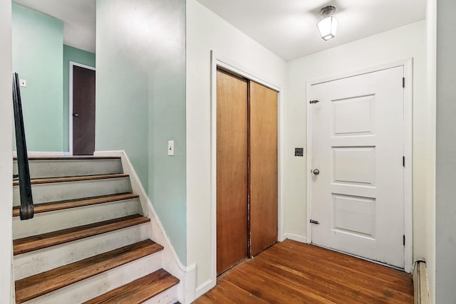 239 Lake St, West Harrison, NY 10604 - staircase with wood finished floors and baseboards