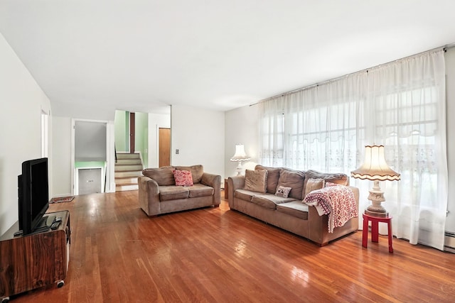 239 Lake St, West Harrison, NY 10604 - living area featuring wood finished floors and stairway