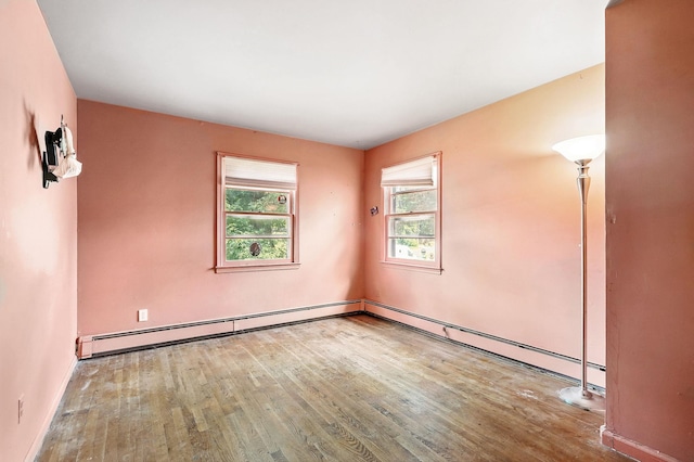 239 Lake St, West Harrison, NY 10604 - empty room featuring wood finished floors and baseboard heating