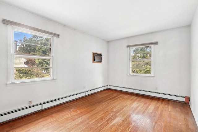 239 Lake St, West Harrison, NY 10604 - spare room featuring baseboard heating and light wood-type flooring