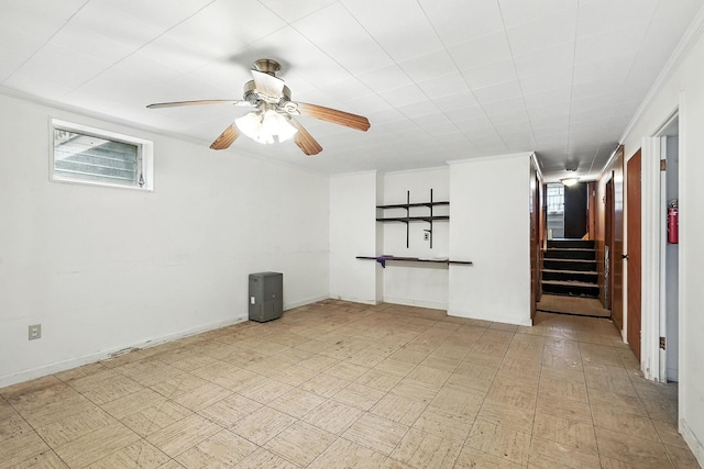 239 Lake St, West Harrison, NY 10604 - empty room featuring a ceiling fan, stairway, healthy amount of natural light, and crown molding