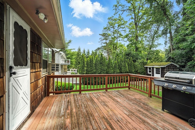 239 Lake St, West Harrison, NY 10604 - deck featuring a grill and an outdoor structure