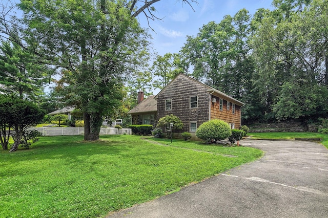239 Lake St, West Harrison, NY 10604 - view of side of property featuring a chimney