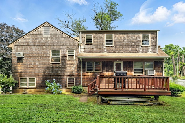 239 Lake St, West Harrison, NY 10604 - rear view of property featuring a lawn and a deck