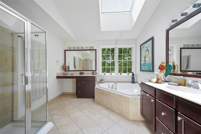 27 Sommerset Dr, Poughkeepsie, NY 12603 - full bathroom featuring a skylight, tile patterned flooring, vanity, a shower stall, and a bath