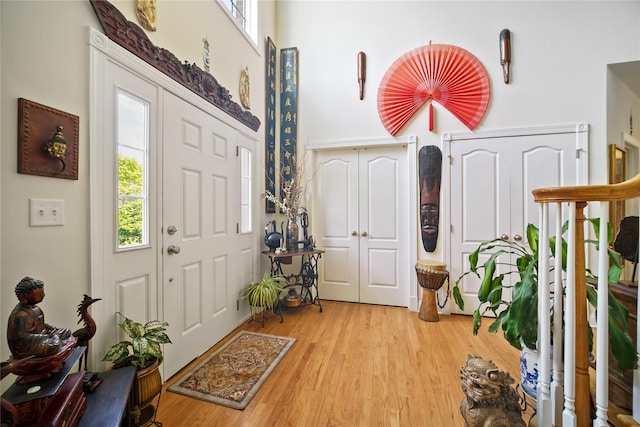 27 Sommerset Dr, Poughkeepsie, NY 12603 - foyer featuring healthy amount of natural light, light wood-style floors, and a towering ceiling